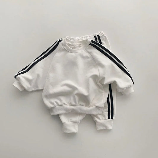 Boys and girls' spring new 2025 children's cool letter printing zipper top pants leisure sports two piece baby suit