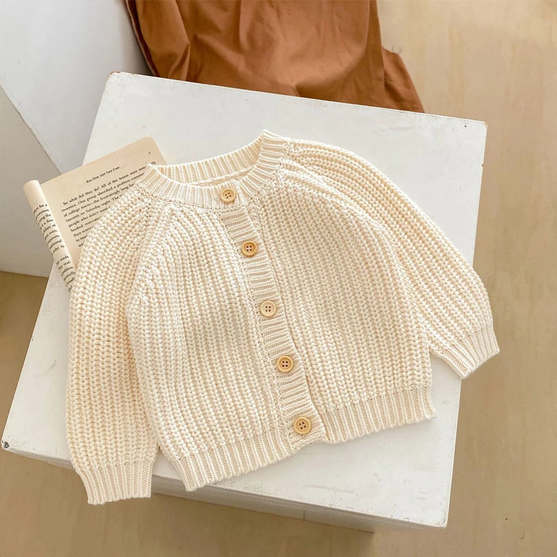New autumn baby clothing, 0-3 year old girls and children's beige knitted long sleeved jacket, cardigan sweater